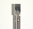 Dasein leopardiano (2000) | Acciaio inox lucido e fotografia | cm 60x70x190 | Courtesy Galleria Bonioni Arte