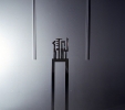 Omaggio a G. Morandi (1994) | Installazione | Acciaio inossidabile lucidato e cornice in gesso | cm 162x33x12